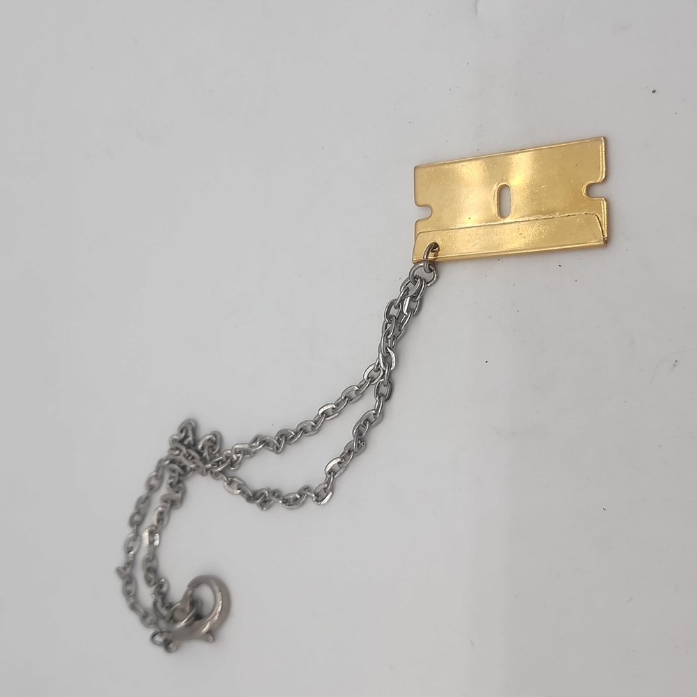 Gold metal razor Necklace